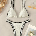 Women's white and blue split bikini swimsuit in polyester fabric with briefs style