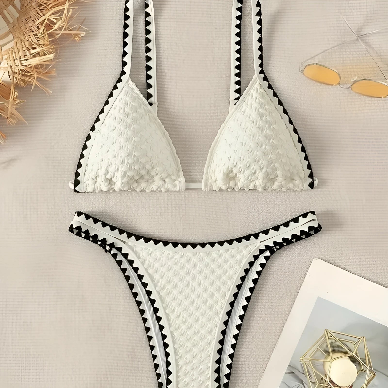 Women's white and blue split bikini swimsuit in polyester fabric with briefs style