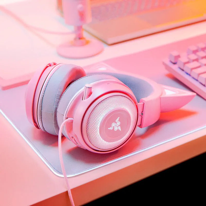 Pink glowing cat earphones with colourful LED lights on ear cups, wired USB connection