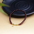 Handmade natural garnet bamboo joint bracelet in copper or silver finish, 6mm bead size.