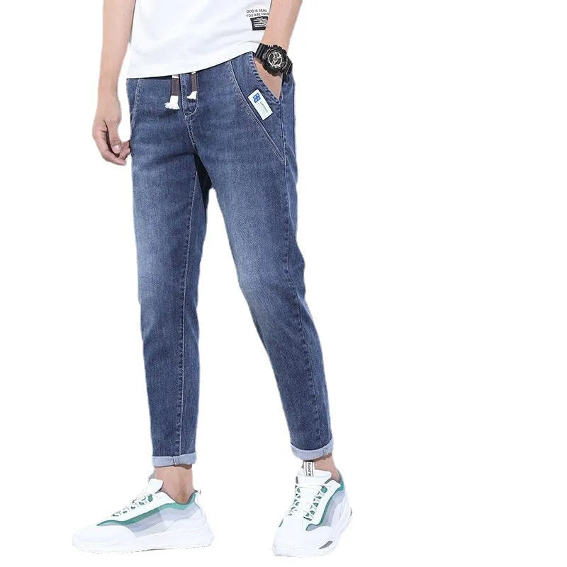 Men's denim stretch casual trousers in dark blue, cropped length, horn leg opening, size 5XL