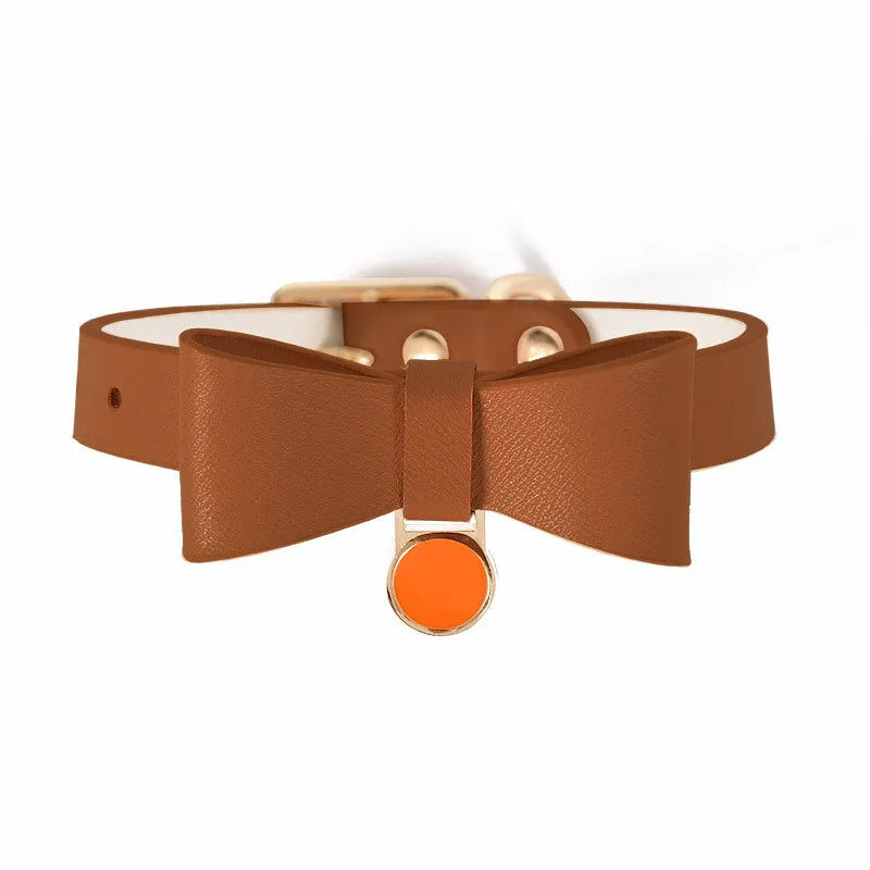 Genuine leather cat collar shown in six colour options: brown, black, apricot, pink, blue, and green.