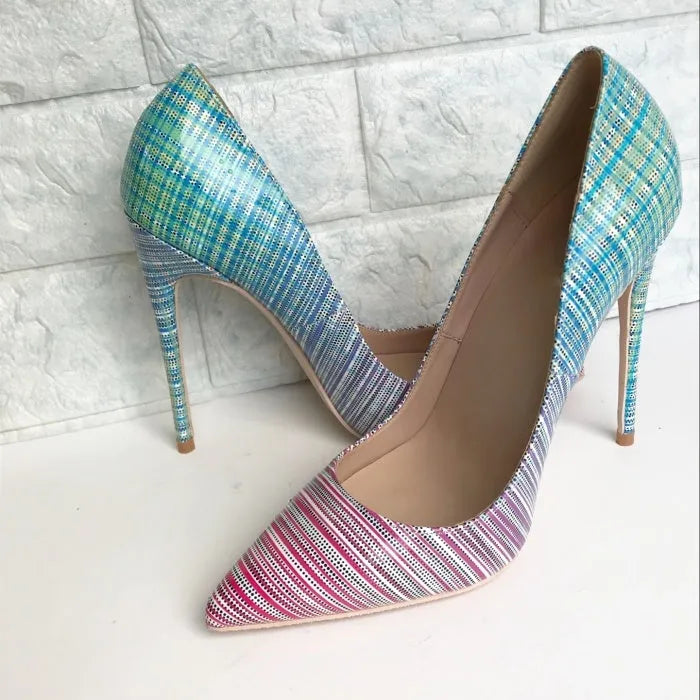 Ladies pink-blue gradient patent leather pointed toe stiletto heels with a tall thin heel on a rubber sole.