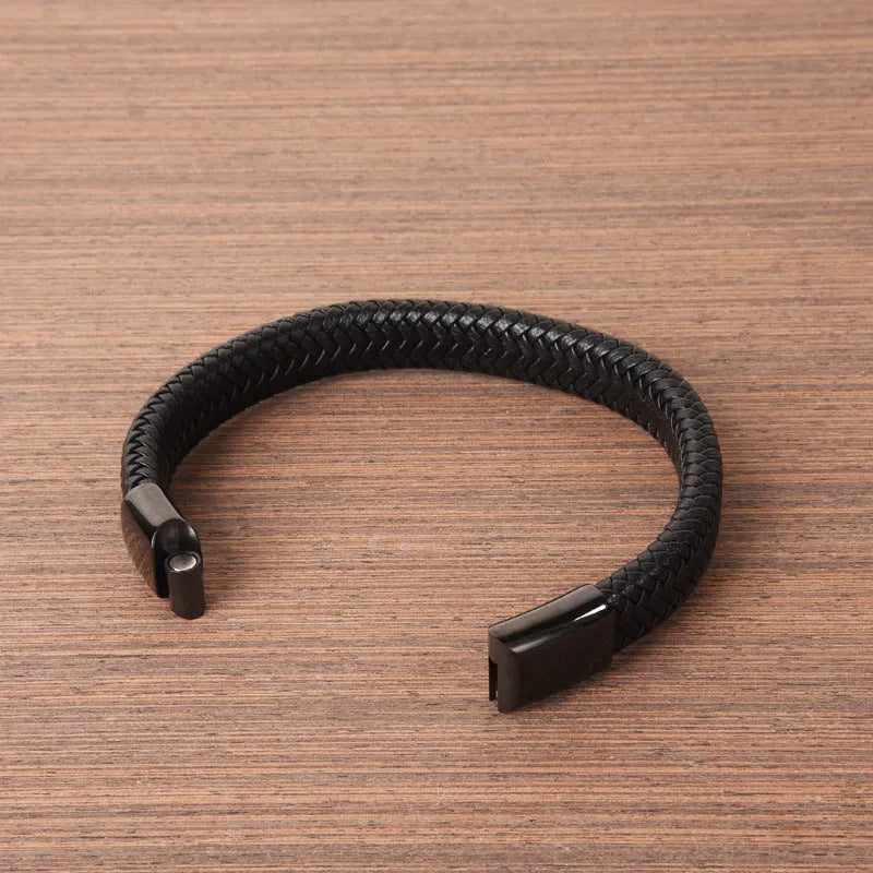 Classic men's genuine leather bracelet in black with 20.5cm length on a neutral background