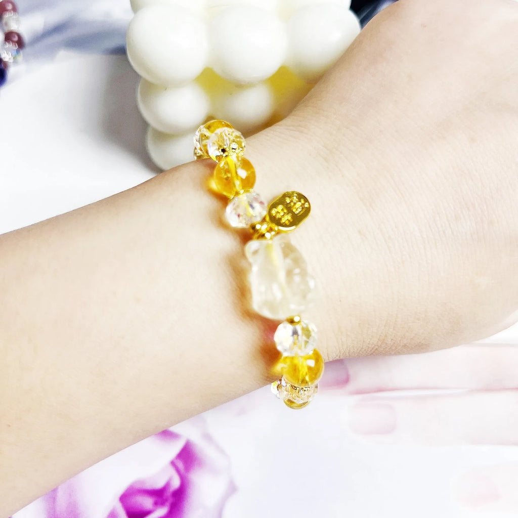 Handmade women's bracelet with citrine crystal stones in nine-tail fox design