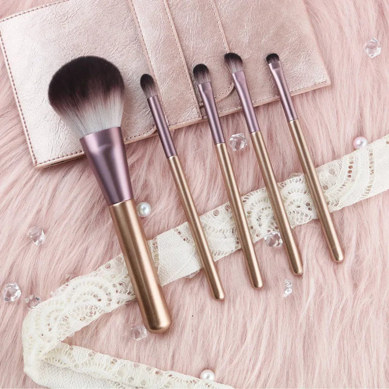 Pink heart makeup brush set with eyeshadow, powder, contour, foundation, blush and highlight brushes