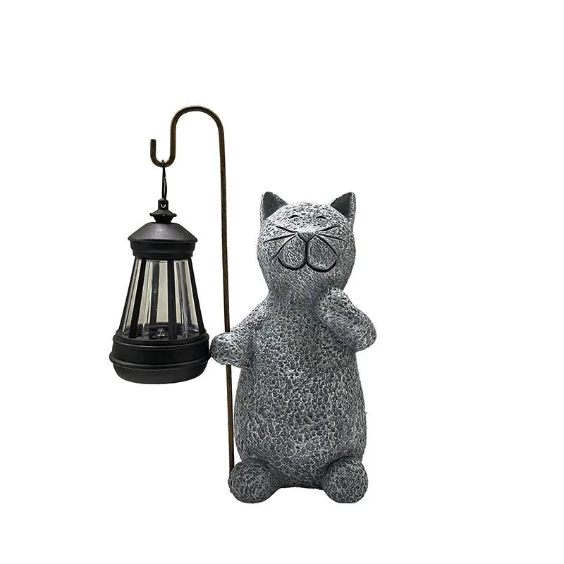 Pastoral style resin solar garden lamp with kitten lifting design for outdoor decoration