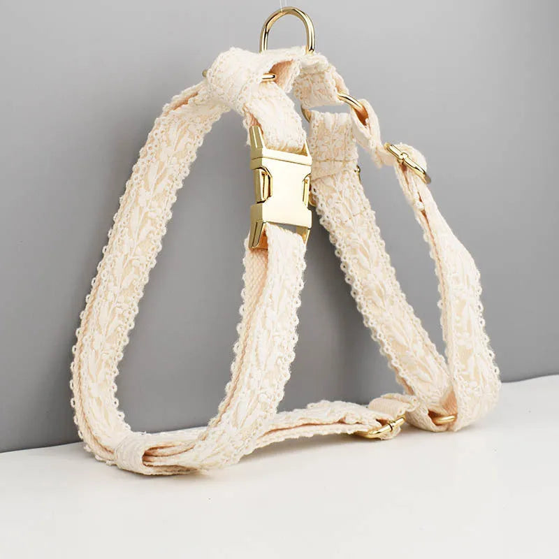 Leaves and lace pattern dog wedding collar and leash set with vest and floral accessories on a white background.