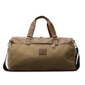Large black Oxford cloth travel messenger bag showing its spacious main compartment.