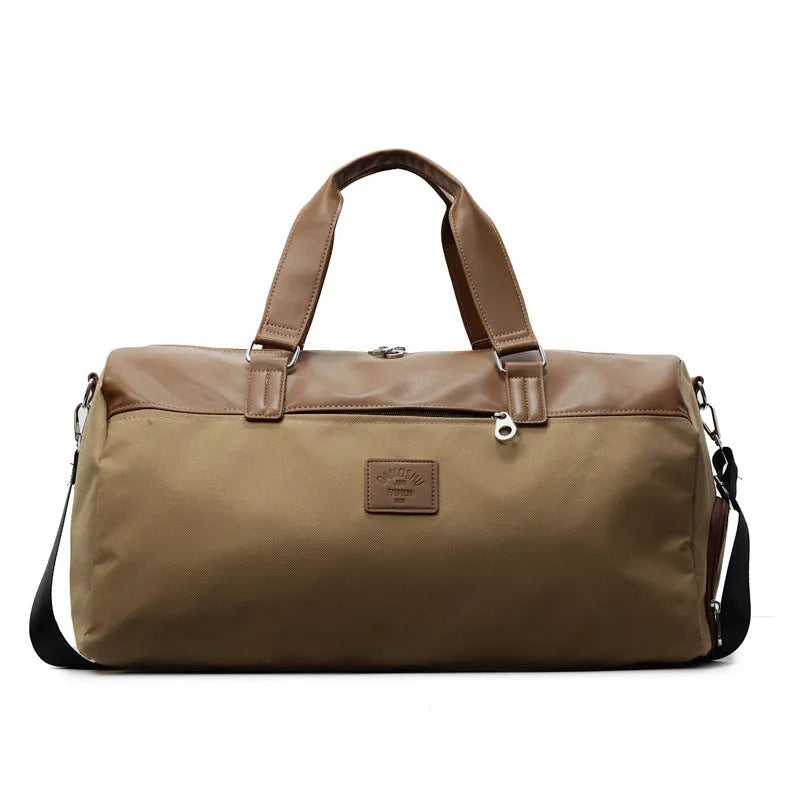 Large black Oxford cloth travel messenger bag showing its spacious main compartment.