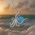Silver stainless steel necklace with a geometric octopus pendant featuring an inlaid opal stone.