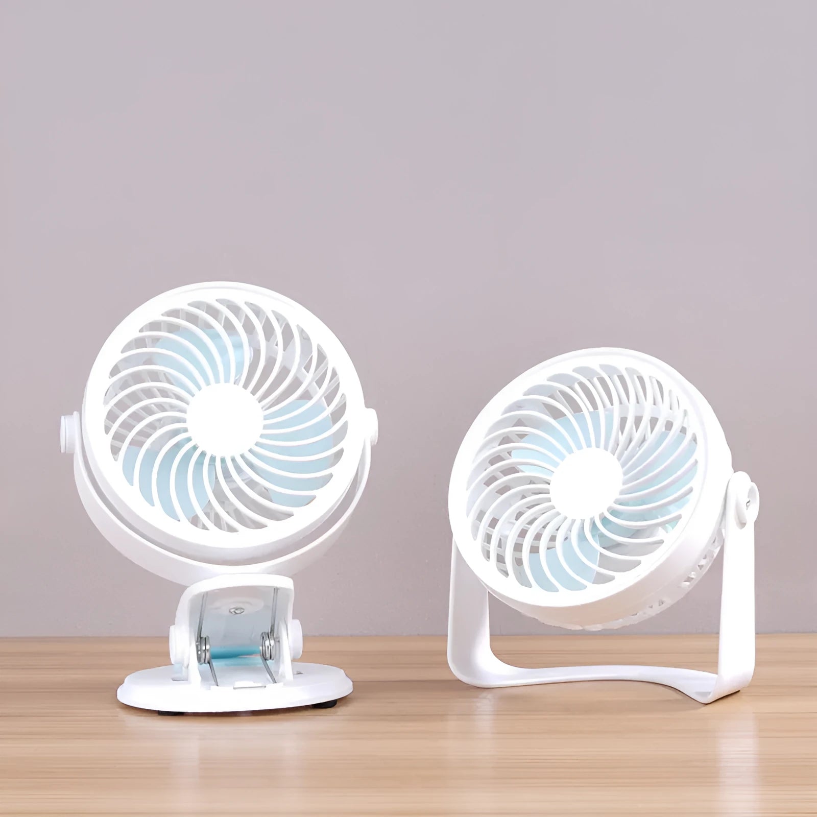 Compact USB-powered desktop fan with three blades and mechanical controls for quiet operation below 36dB