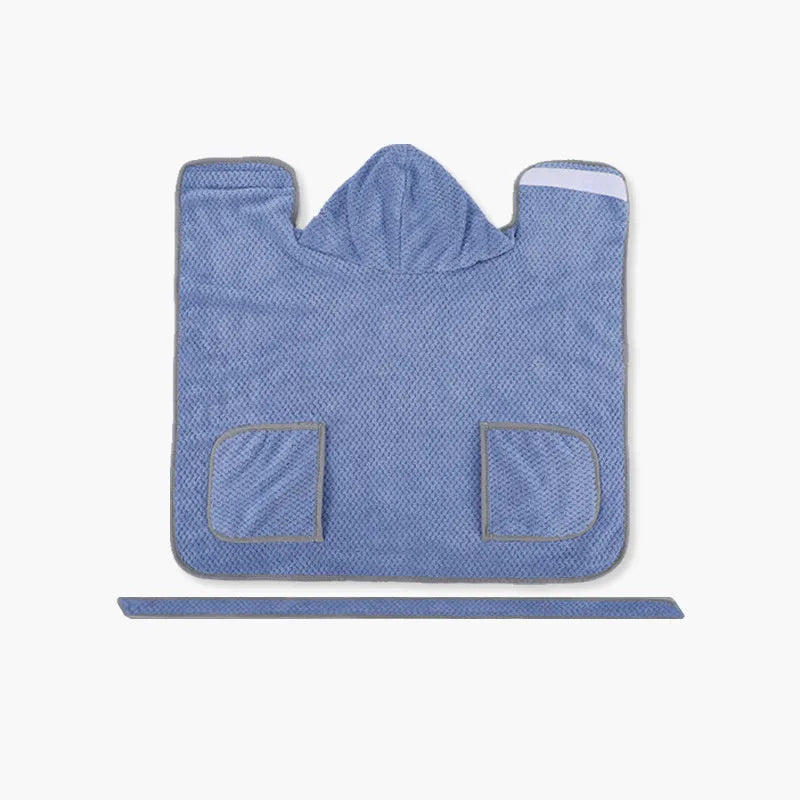 A blue dog bath robe towel with an adjustable waistband wrapped around a dog, showing the snap button closure.