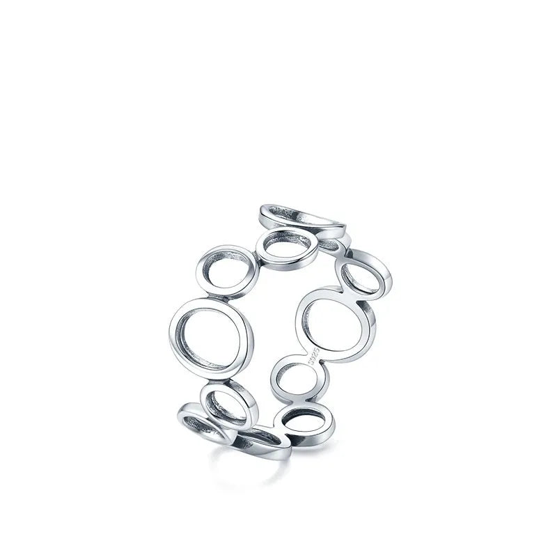 S925 sterling silver geometric circle ring with ellipse motif, women's size US 7 on display