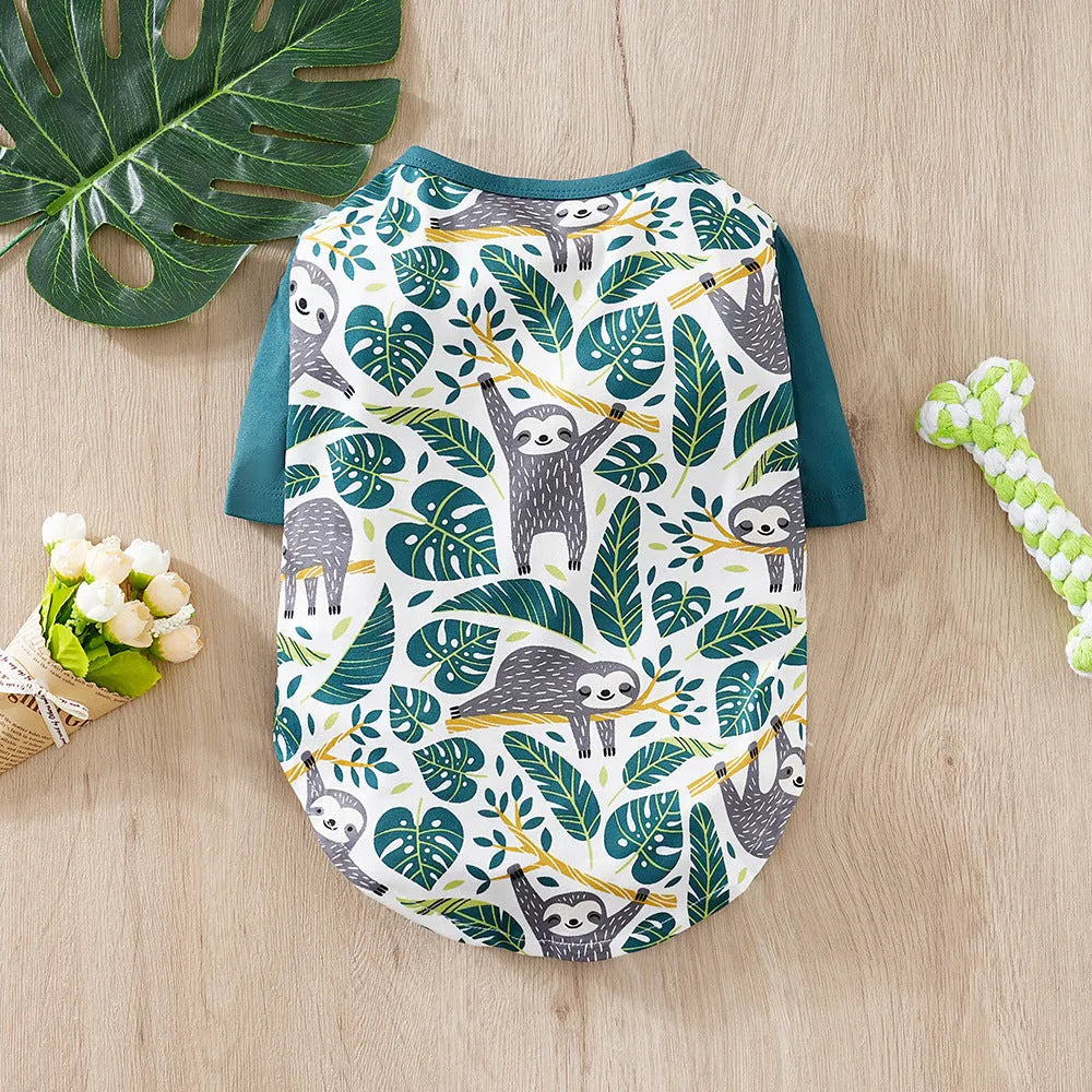 Colourful printed polyester t-shirt on a small dog, showing the casual fit and design.