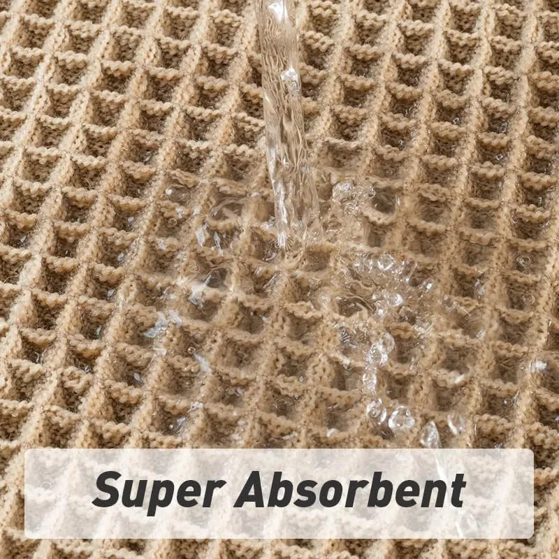 Square checkered pattern non-slip bathroom carpet on tiled floor in beige colour.