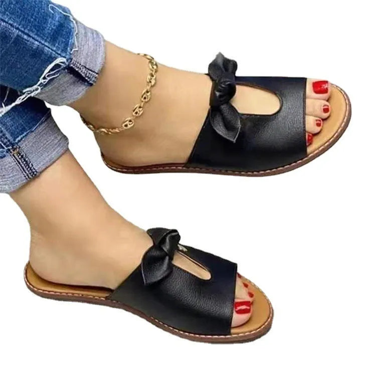 Ladies sandals with decorative bow on artificial PU upper in fish mouth slipper design