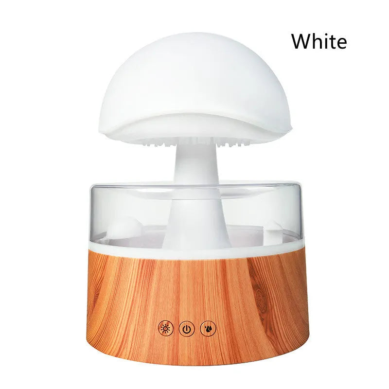 White cloud-shaped humidifier and aroma diffuser with falling water droplets and coloured lights