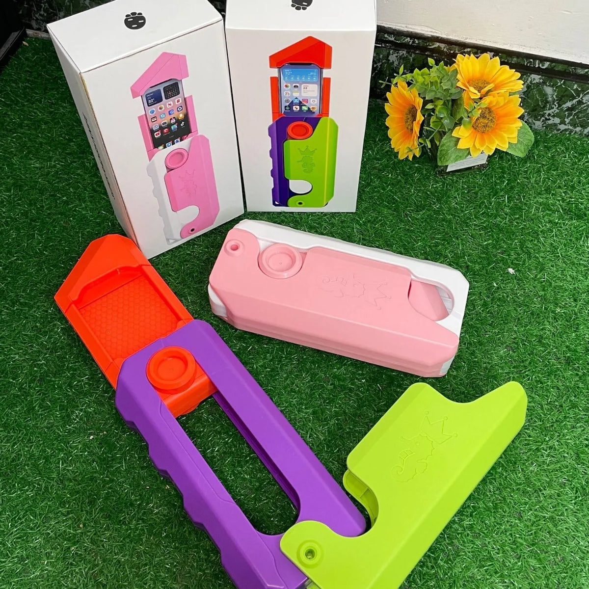 Radish knife phone case decompression toy in pink and white or purple orange, plastic universal phone case.