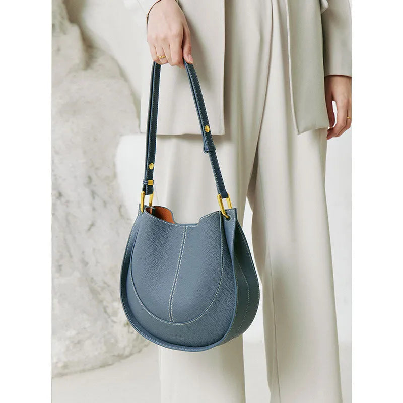 Small round genuine top grain leather crossbody bag for women with splicing design and open outer pocket