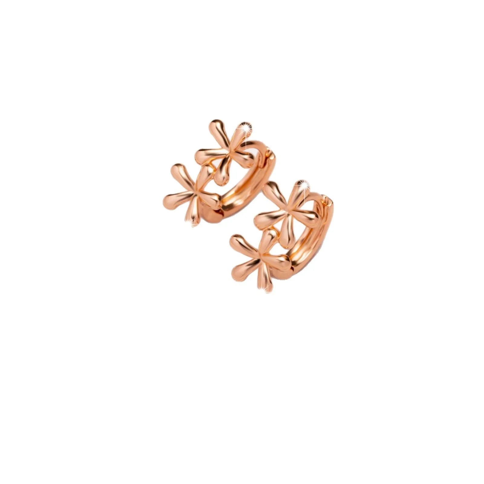 Close-up of rose gold drop earrings with 3D floral and waterdrop design on a white background.
