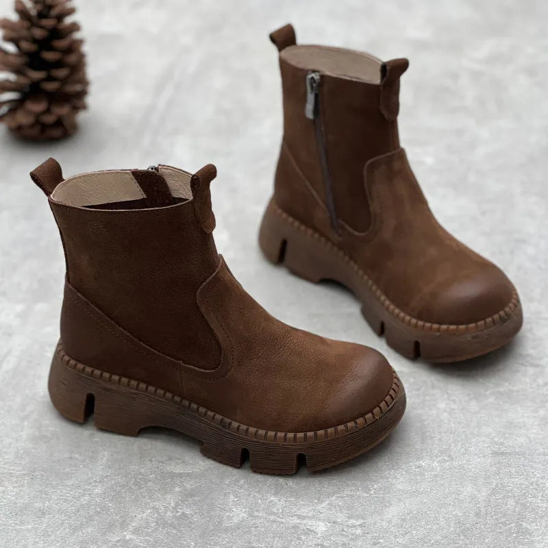 Women's round toe mid heel leather boots in brown with side zipper and rubber sole