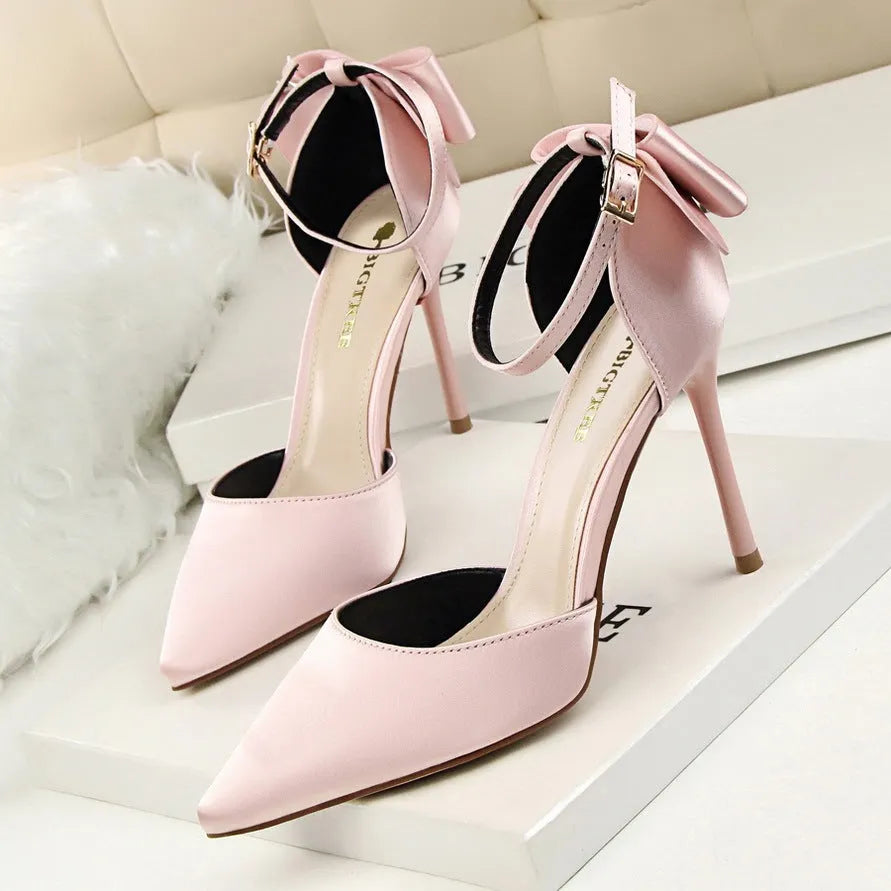 High heel stiletto wedding shoes with pointed toe, ankle strap, buckle closure, artificial PU upper and rubber sole.