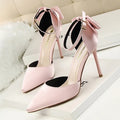 High heel stiletto wedding shoes with pointed toe, ankle strap, buckle closure, artificial PU upper and rubber sole.