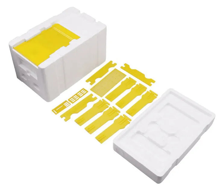Three white EPS foam bee transport boxes for beehive supplies.