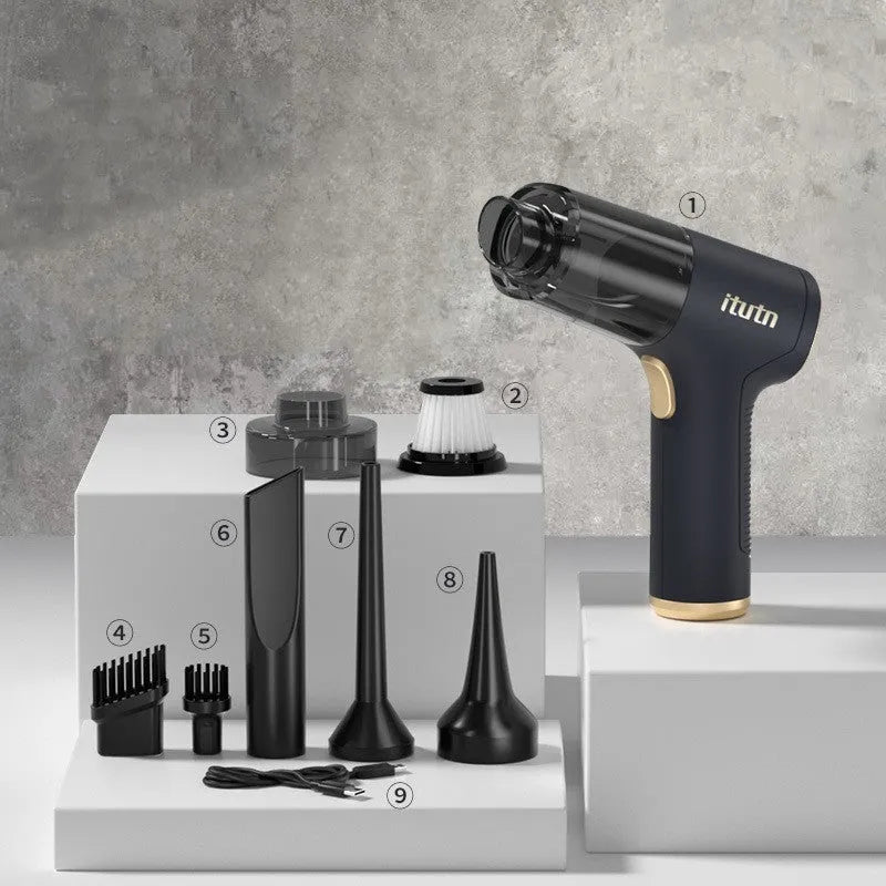 Black wireless handheld vacuum cleaner with attachments including nozzles and brushes on a white background.