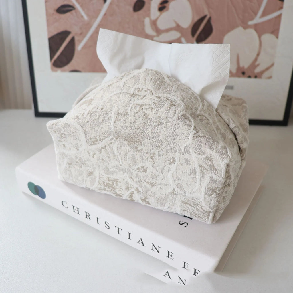 Cotton floral tissue box cover in beige, blue, and brown colour options on a table.