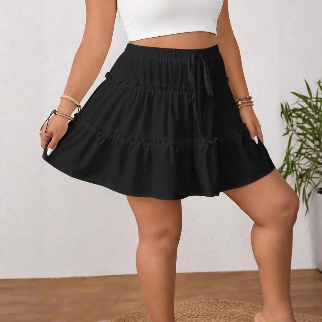 White adjustable lace-up A-line pleated short skirt made from milk silk fabric.