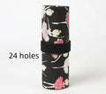 Canvas square rolling pencil case with ballet girl printing showing multiple colour pencils organised in slots