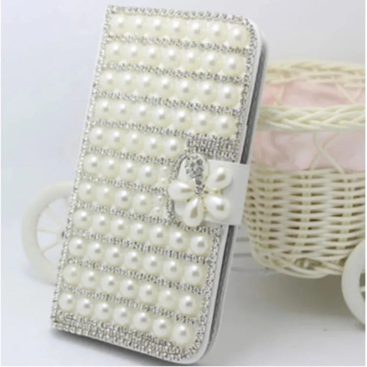 Faux leather phone case with rhinestones for iPhone 14 15 16 series in white and black designs including gem wallet and crown fox
