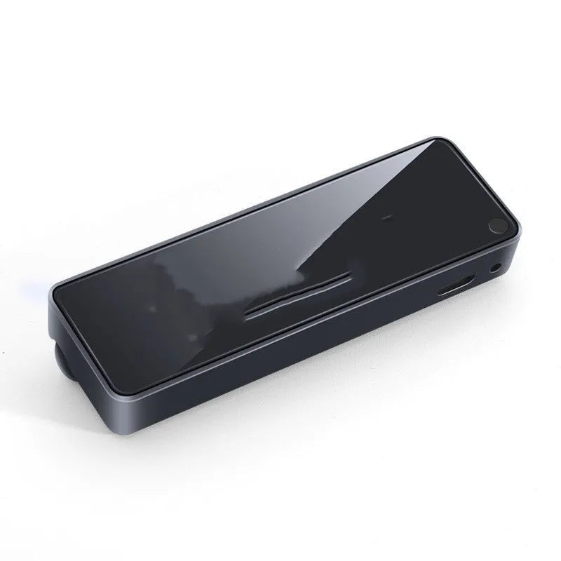 Black car air vent perfume diffuser with LED mood light mounted on vehicle ventilation louvre