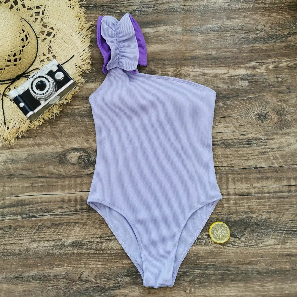 Women's single-shoulder suspender tube top one-piece swimsuit with high waist in solid colour.