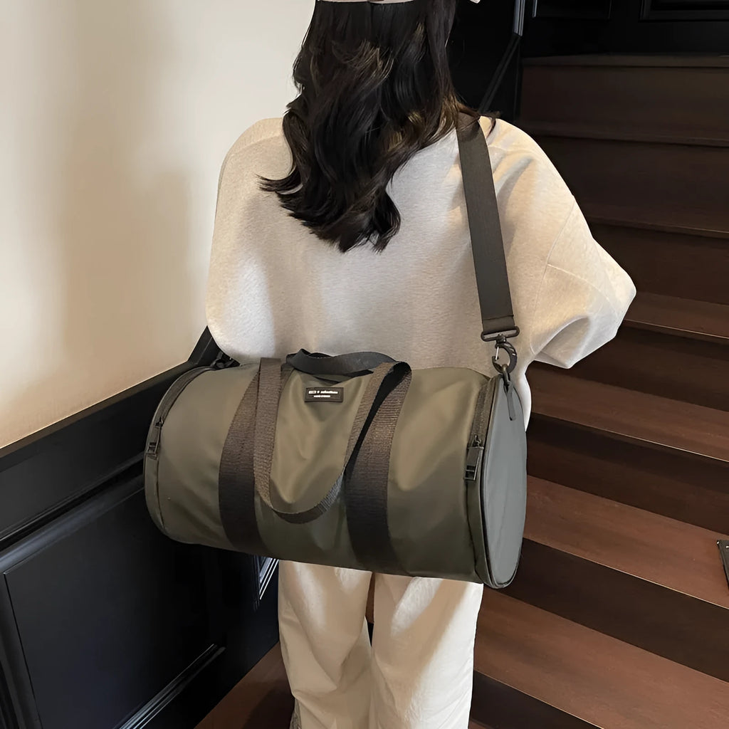 Waterproof Oxford cloth sports handbag in black, dark gold, or dark grey for leisure travel