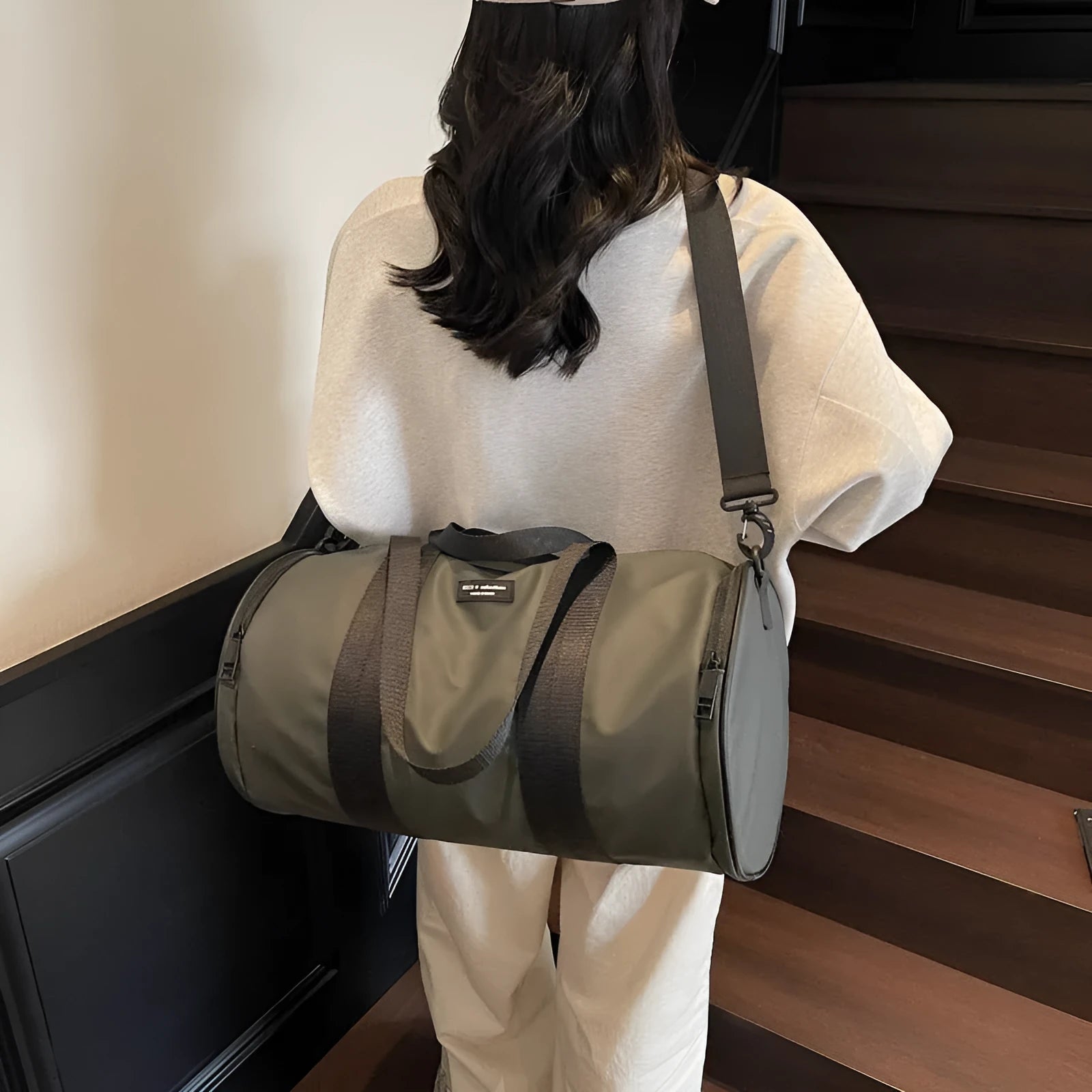 Waterproof Oxford cloth sports handbag in black, dark gold, or dark grey for leisure travel
