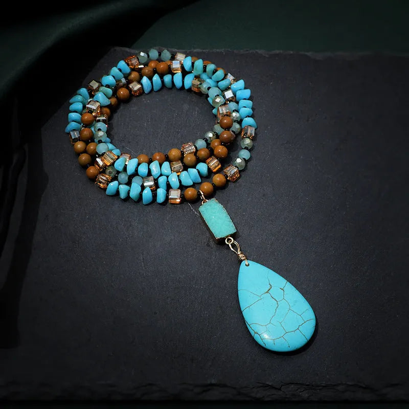 Blue turquoise heart and water drop shape pendant necklace with mixed gem inlay on a ball bead chain.