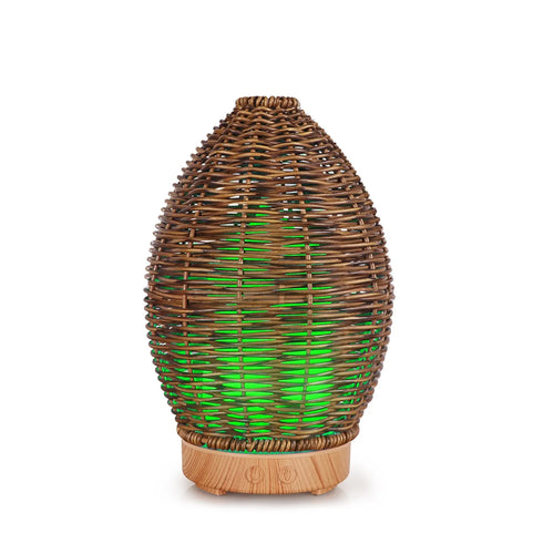 Hollow rattan aroma diffuser with light wood grain finish, showing 100ml water tank