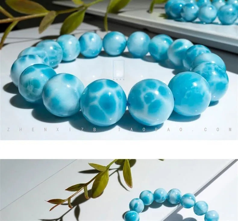 Blue manually crafted Bodhi bracelet with sea-pattern crystal stones and pearl details.