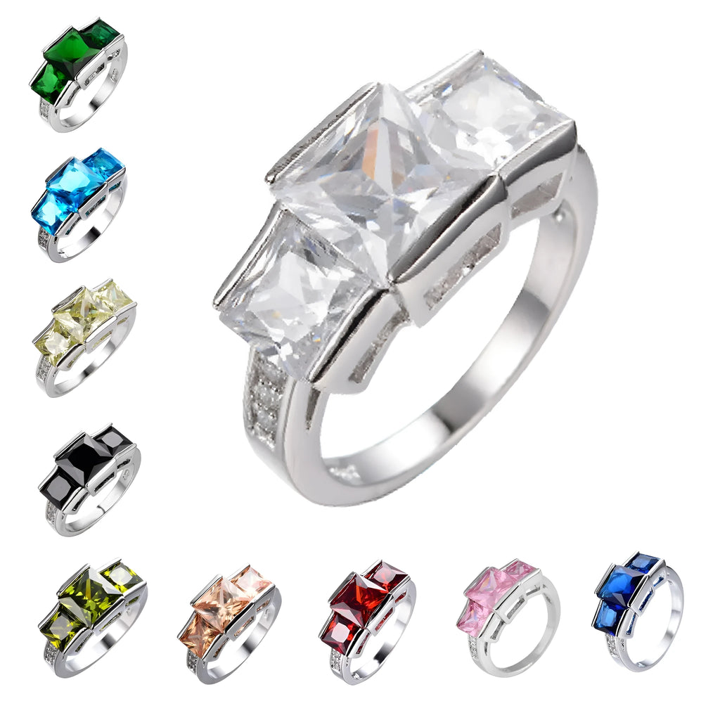 Colourful women's metal ring in copper with electroplated finish, showing geometric and rainbow design.