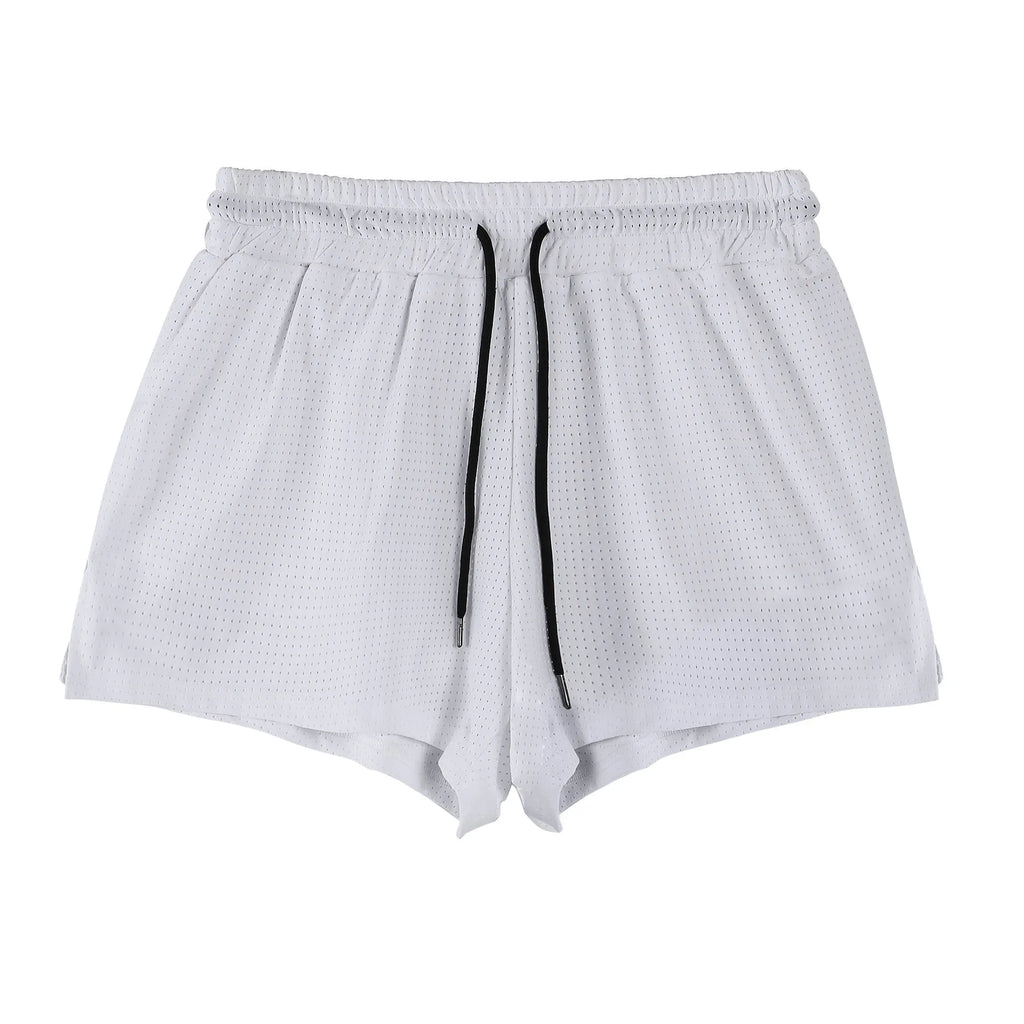 Man wearing black quick-drying nylon summer shorts in a sports leisure style.
