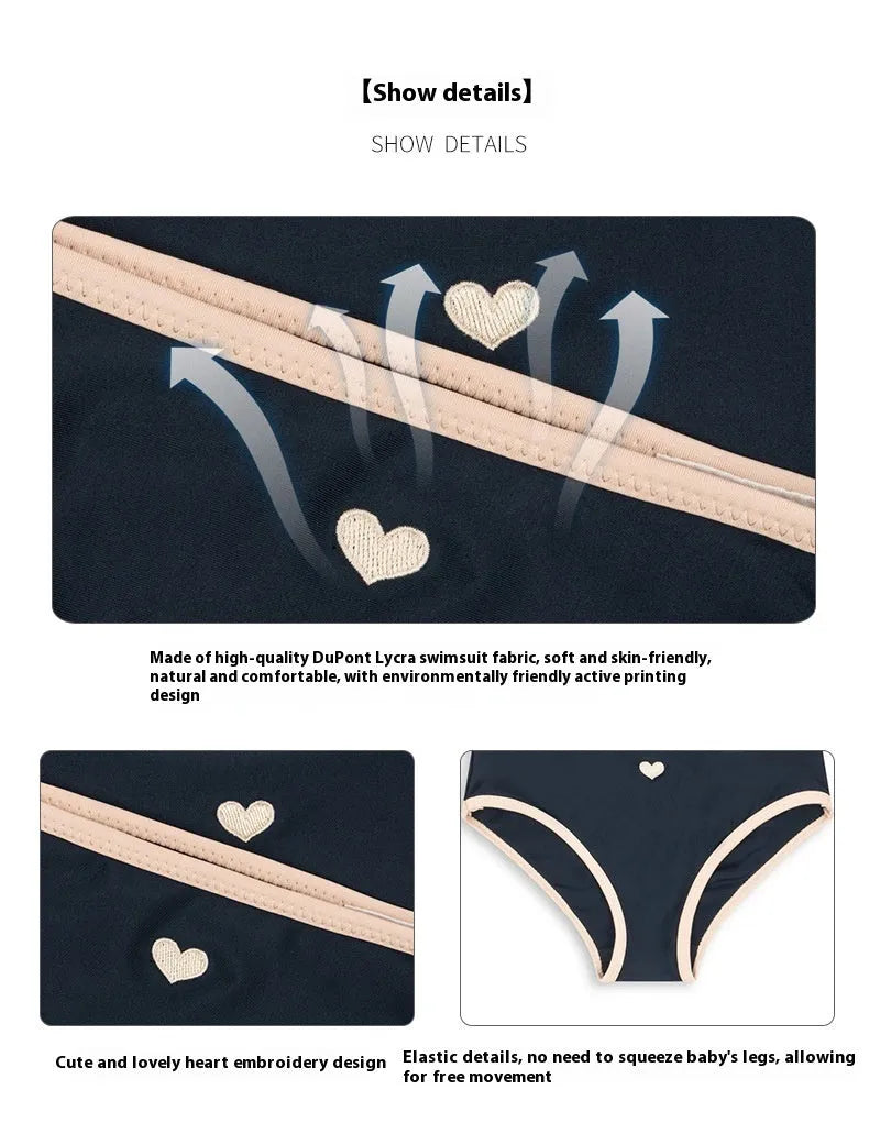 Dark blue split colour baby girl's swimsuit with briefs and split design for swimming.