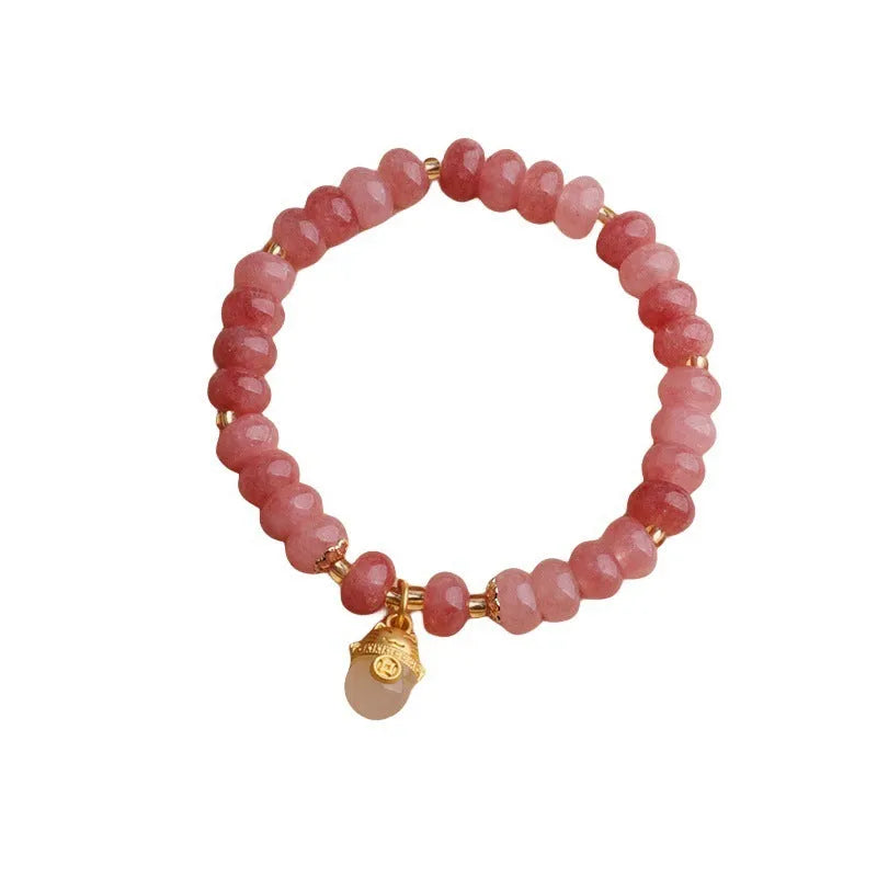 Women's strawberry quartz bracelet with lucky cat charm and animal zodiac modelling in retro style