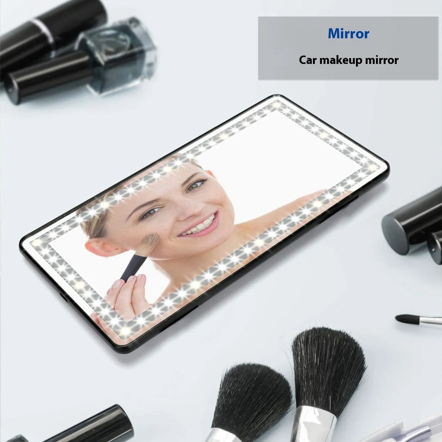 Car sun louver mirror with LED touch lamp clipped to sun visor, showing aluminium mirror and black light bars on four sides