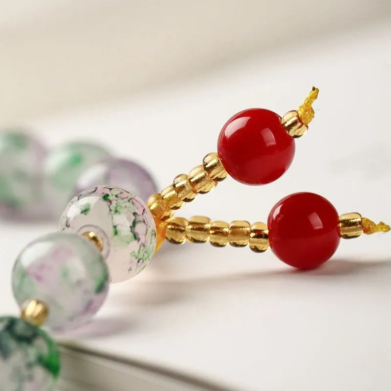 Women's ceramic woven bracelet with geometric crystal beads in five colours: brown, green, light blue, pink, purple
