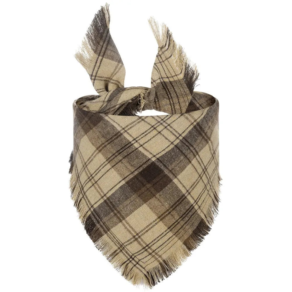 Plaid triangle dog bandana with tassel edges in autumn colours like brown, green, and orange.