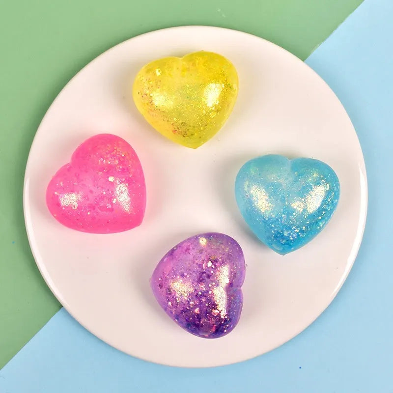 Malt sugar love squeezing toy vent ball in TPR, heart shape, 6 cm by 5.5 cm, random colour, for teens aged 7-14