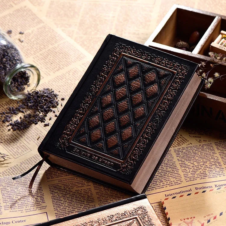 Embossed faux leather notepad in bronze colour with three-dimensional pattern and thick pages